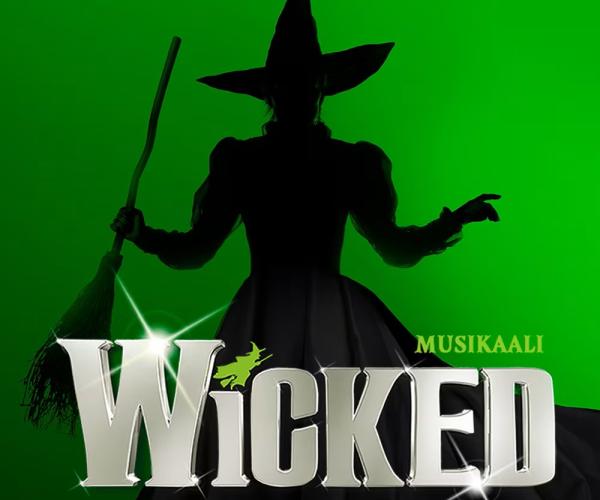 Wicked-musikaalin juliste, jossa noidan siluetti.